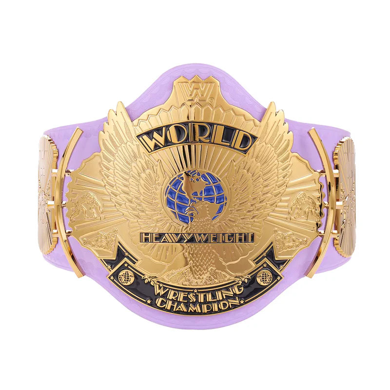 Gold and purple world heavyweight wrestling championship belt on a white background