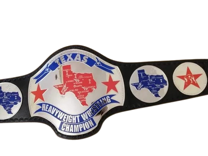 A novelty Texas Heavyweight Wrestling Champion belt featuring a large central silver plate with a red and blue map of Texas, flanked by smaller circular plates on a black strap, set against a plain white background.