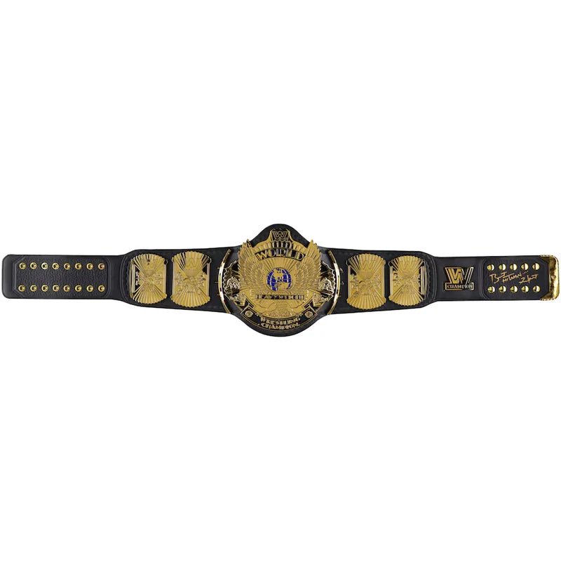 Wrestling championship belt with gold and black design on a white background