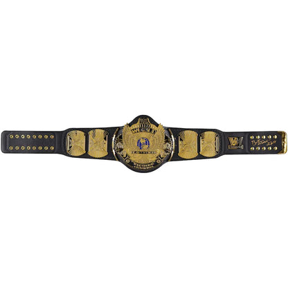 Wrestling championship belt with gold and black design on a white background