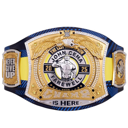 A replica WWE John Cena Championship belt featuring a large gold-toned central plate with silver and black details, flanked by blue and yellow strap sections with additional championship plates on the sides.