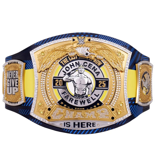 A replica WWE John Cena Championship belt featuring a large gold-toned central plate with silver and black details, flanked by blue and yellow strap sections with additional championship plates on the sides.