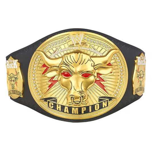 WWE Raw Championship belt featuring a large gold-toned central plaque with a bull head and red eyes, flanked by smaller gold side plaques, all mounted on a black strap against a white background.