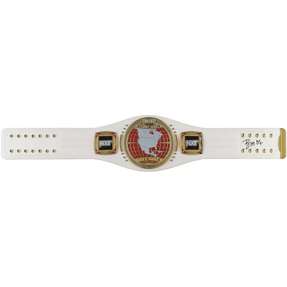 A white and gold boxing championship belt featuring a central round plate with a red and gold map design, flanked by two digital weight displays showing 140 lbs, with a signature on the right strap.