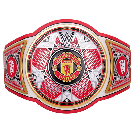 WWE Manchester United Champions Belt replica, featuring a large central medallion with the Manchester United crest, flanked by two red and white side plates with gold trim, on a plain white background.