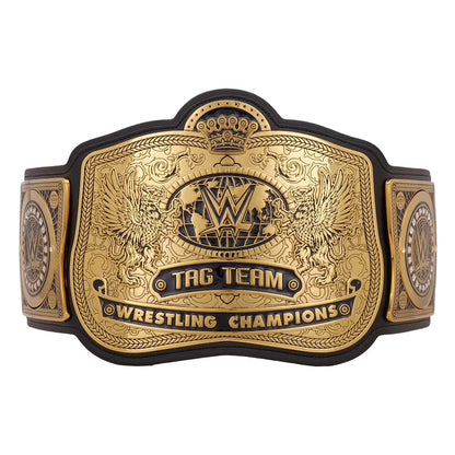 Gold and black wrestling championship belt with 'Tag Team Wrestling Champions' text on a white background