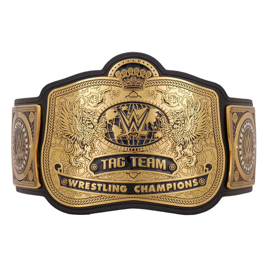 Gold and black wrestling championship belt with 'Tag Team Wrestling Champions' text on a white background