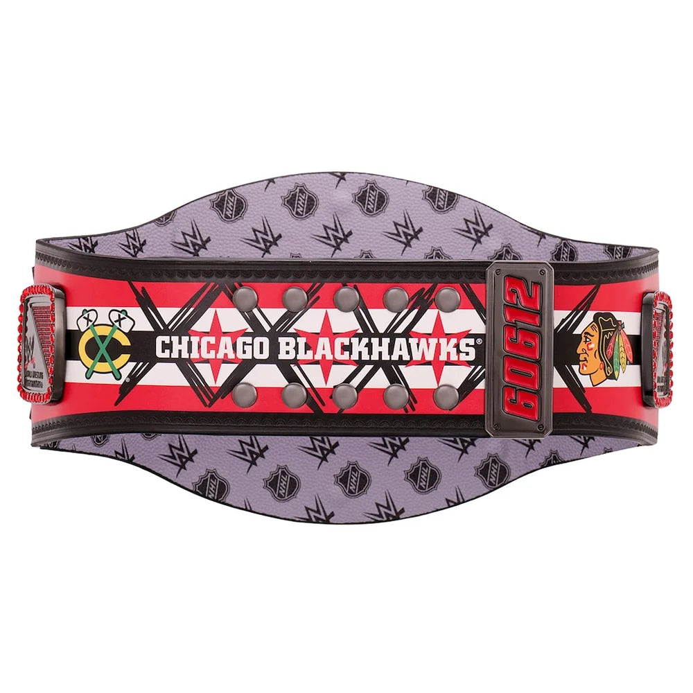 A Chicago Blackhawks WWE wrestling belt featuring a purple patterned fabric body, a red and white center stripe with black graphics, and a black buckle with red '2012' text.