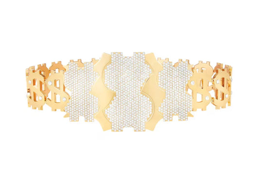 A gold-tone cuff bracelet featuring a central Bitcoin symbol paved with clear stones, flanked by two Bitcoin dollar-sign motifs on each side, set against a plain white background.