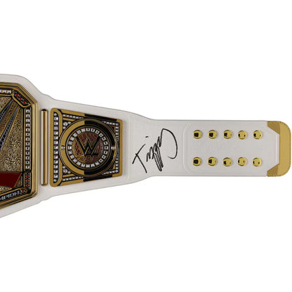 White championship belt with gold accents and a signature on a white background