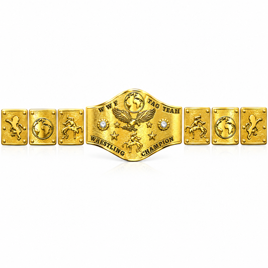 A gold-colored WWE Tag Team Championship belt with multiple engraved metal plates, featuring an eagle and wrestlers, displayed on a clean white background.
