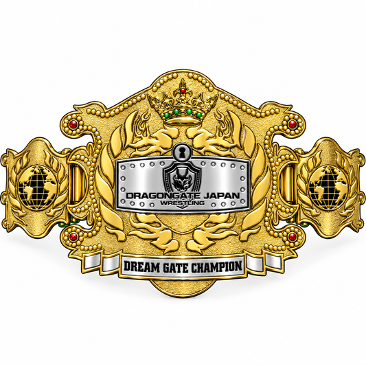 A gold and silver Dragon Gate Japan Wrestling championship belt on a plain white background. The belt features an ornate golden design with a central silver plate, a small green and red jewel on a crown, and the text 'DRAGON GATE JAPAN WRESTLING' and 'DREAM GATE CHAMPION'.