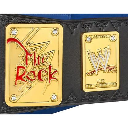 Wrestling championship belt with 'The Rock' and WWE logos on gold plates.