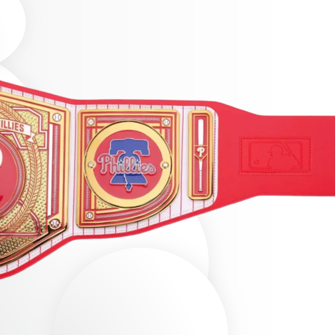 Red championship belt with gold and blue accents featuring the Phillies logo on a white background
