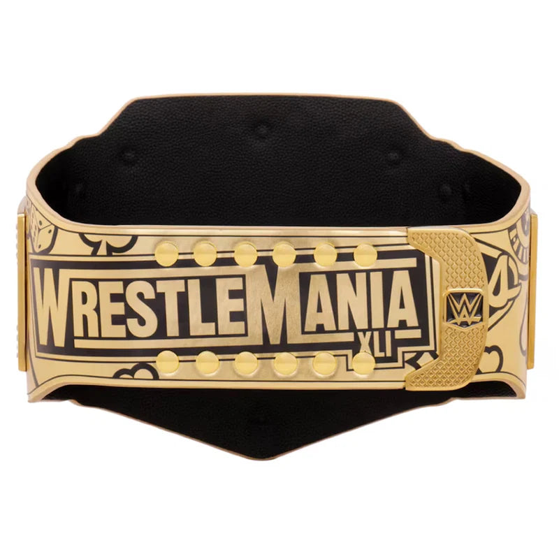 A WrestleMania XII championship belt with a gold-tone metal frame, black interior, and black-and-gold plaque featuring the WrestleMania XII logo and WWE branding.