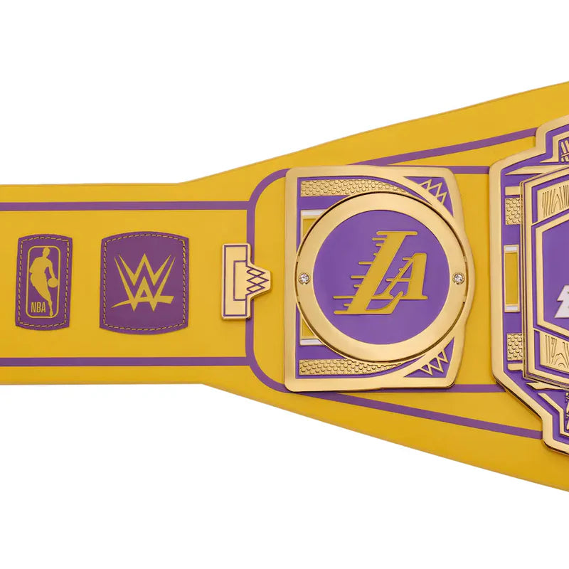 Wrestling championship belt with purple and gold design on a white background