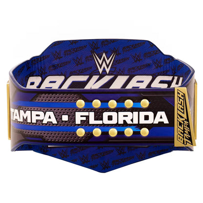 Wrestling championship belt with 'Backlash Tampa Florida' text and WWE logo.