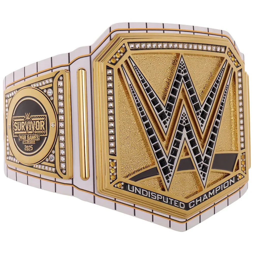 Wrestlemania 2025 Survivor Championship belt featuring a large gold-toned central plate with a black and silver WWE 'W' logo, flanked by a gold and silver chain strap with rhinestone accents.