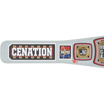 A WWE championship belt shown in profile on a plain white background. The belt has a light gray strap with multiple plates: a large black plate with white 'CENATION' text, a blue and red 'ASE TOPE LATE' plate, a gold and black WWE logo plate, and other championship plates with red and black trim.