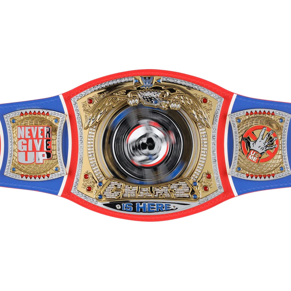 A custom championship belt featuring a gold central plate with a spinning disc in the middle, flanked by blue side panels with red borders and gold emblems. The left panel reads 'NEVER GIVE UP' and the right panel reads 'UP ME'.