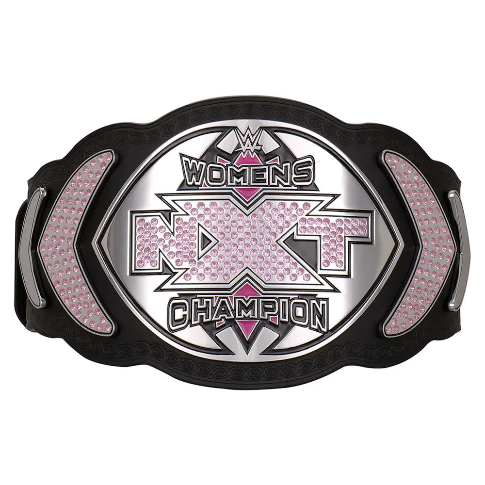 WWE Women's NXT Champion belt featuring a black textured frame, silver metallic lettering, and pink rhinestone accents on a white background.
