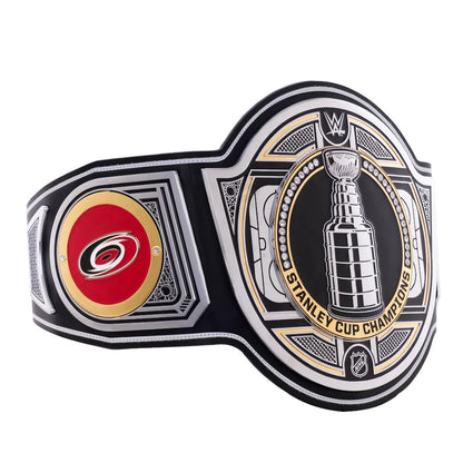 Wrestling championship belt with NHL and Carolina Hurricanes logos on a white background