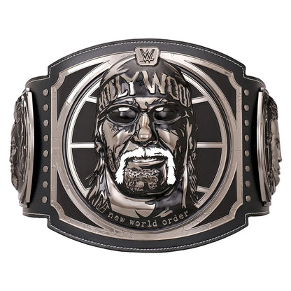 WWE WrestleMania 32 'Hollywood' Hulk Hogan championship belt featuring a large central portrait of Hulk Hogan with 'Hollywood' and 'new world order' text, on a black and silver strap with decorative side plates.