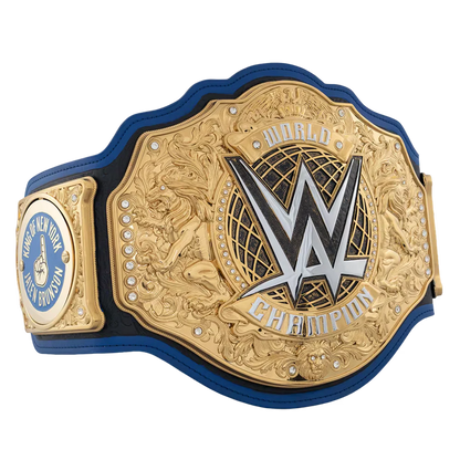 WWE World Champion belt featuring a large gold-toned central plate with the WWE logo, blue leather strap, and a smaller blue and gold insert plate on the left.