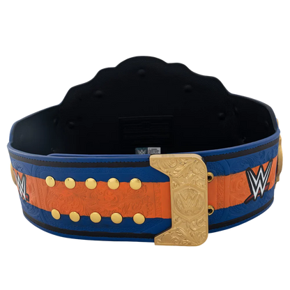 A WWE championship belt featuring a blue and orange textured strap, gold studs, and a large ornate gold buckle, shown against a plain white background.