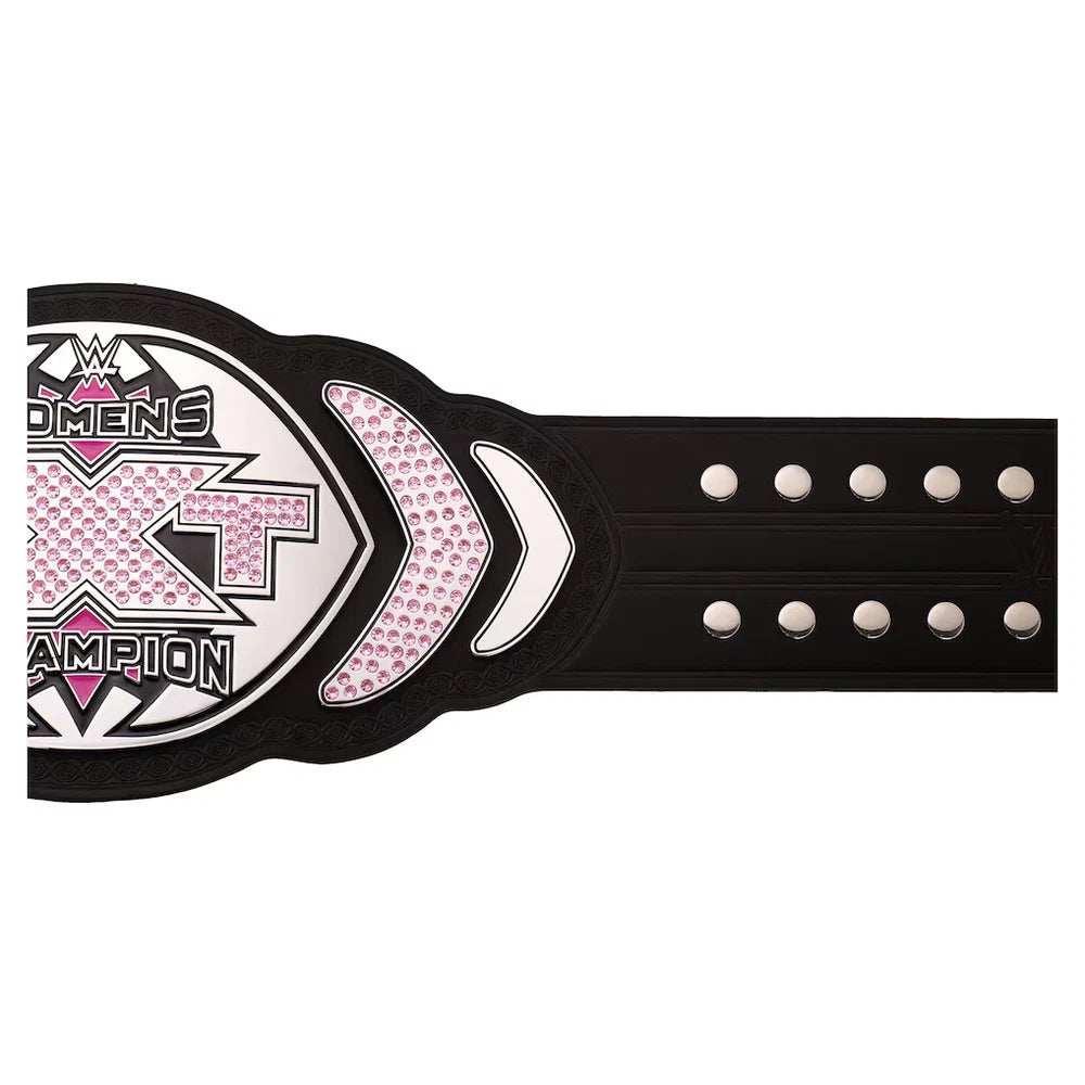 A black wrestling championship belt featuring pink rhinestone accents and silver-tone studs, shown against a plain white background.