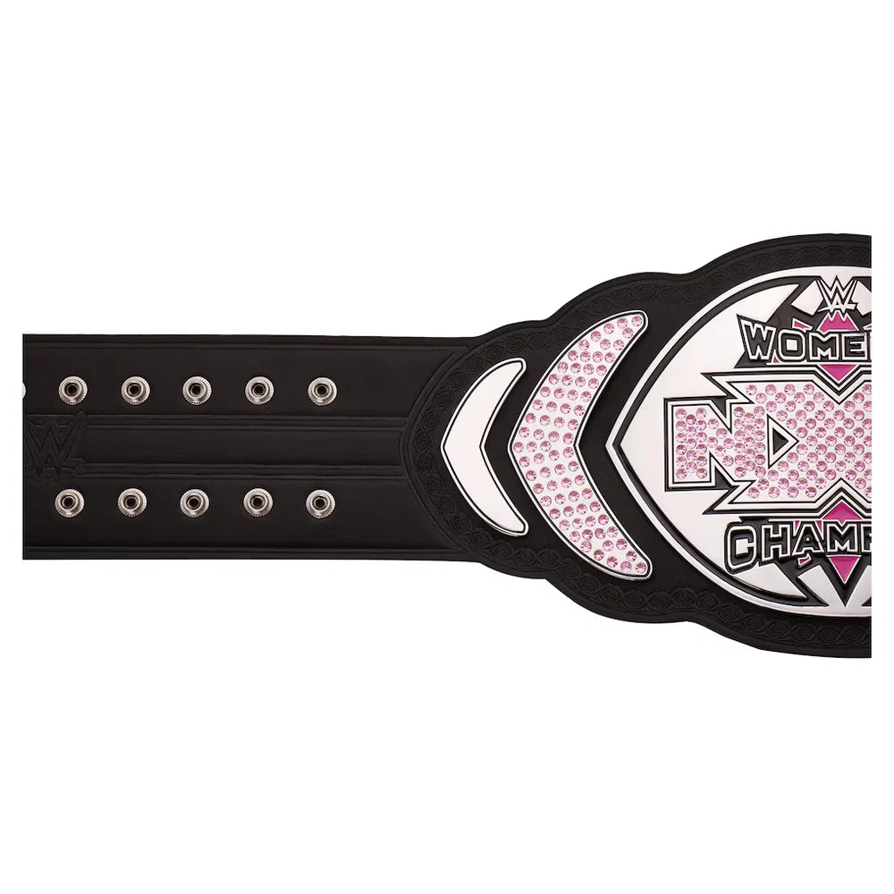 A women's championship belt with a black strap, silver studs, and a large central plate featuring pink rhinestones and the text 'WWE Women's Championship'.