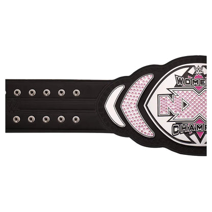 A women's championship belt with a black strap, silver studs, and a large central plate featuring pink rhinestones and the text 'WWE Women's Championship'.