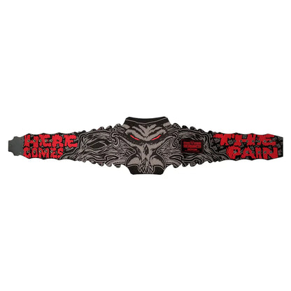 A black and gray metal belt buckle featuring a stylized wolf head design with red eyes, flanked by red text reading 'HERE COMES THE PAIN' on a white background.