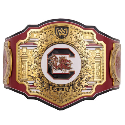 Decorative belt with gold and red design on a white background
