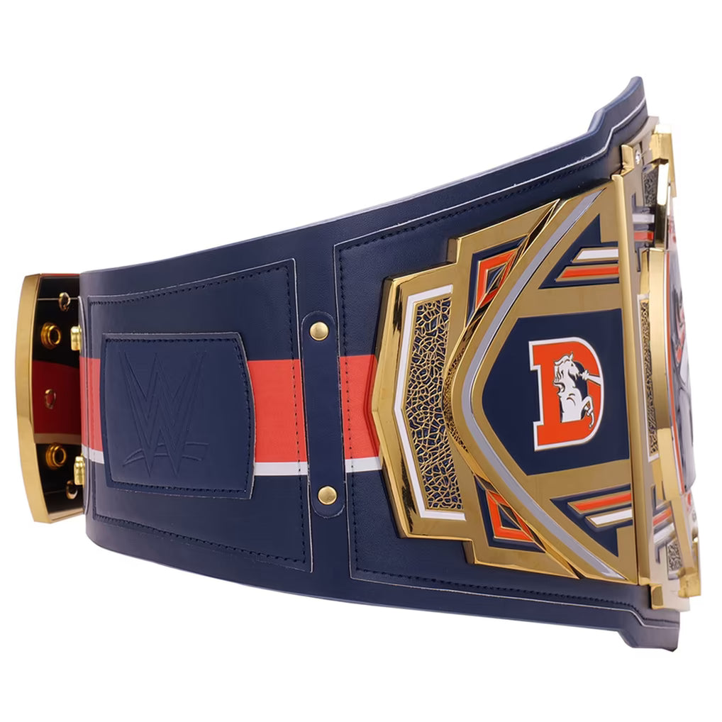 Navy blue championship belt with gold and red accents, featuring a logo on a white background.