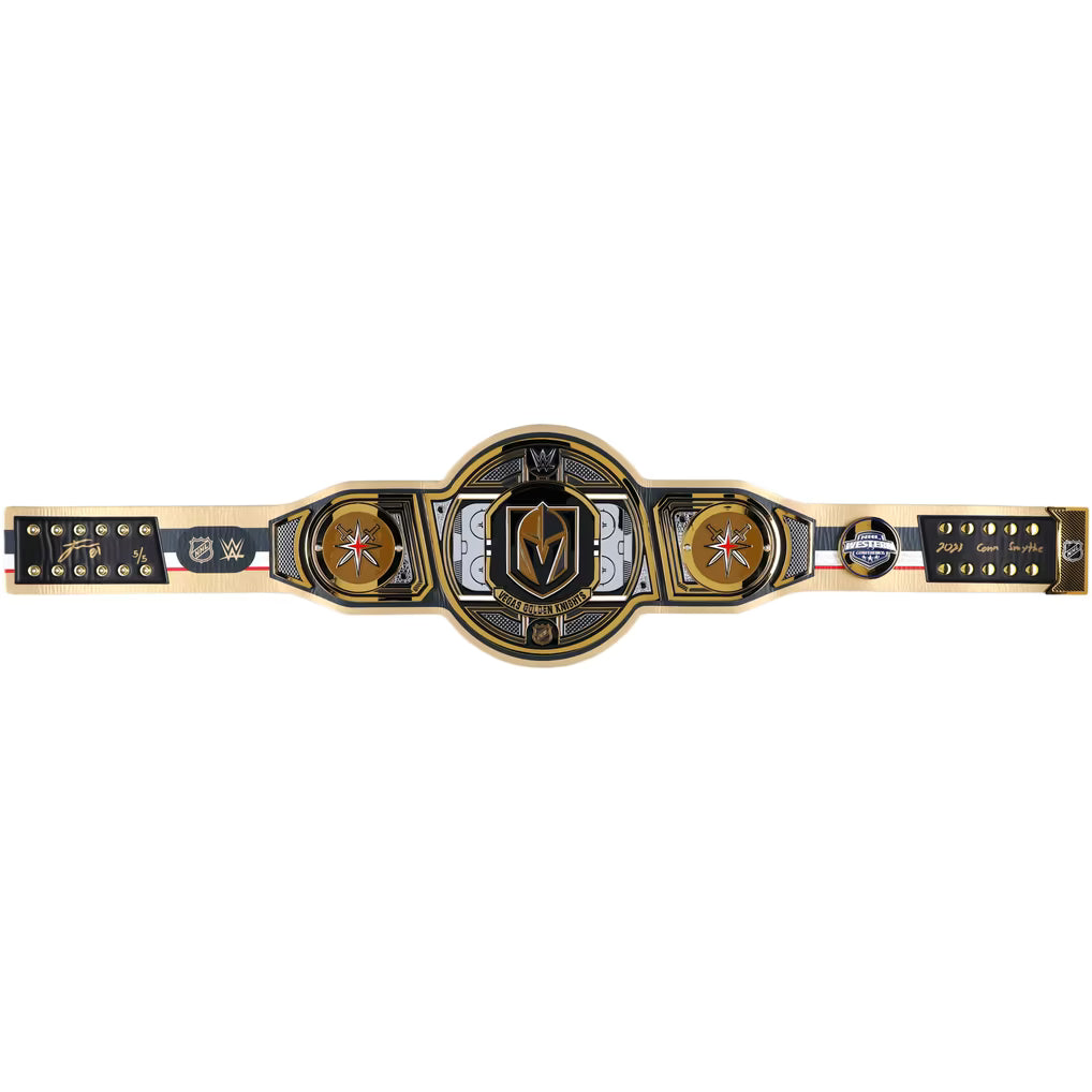A WWE Raw Championship belt laid horizontally on a plain white background. The belt features a large central gold and black oval plate with the WWE Raw logo, flanked by two round gold medallions, and a black strap with gold studs and branding on both ends.