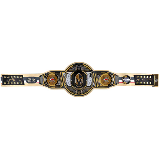 A WWE Raw Championship belt laid horizontally on a plain white background. The belt features a large central gold and black oval plate with the WWE Raw logo, flanked by two round gold medallions, and a black strap with gold studs and branding on both ends.