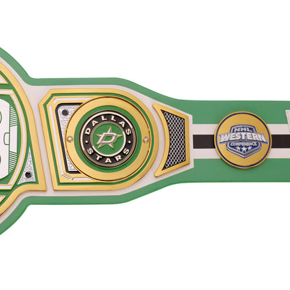 A close-up of a Dallas Stars NHL Western Championship belt, showing the green, gold, and white metal plates with the Dallas Stars logo and an NHL Western Championship logo.