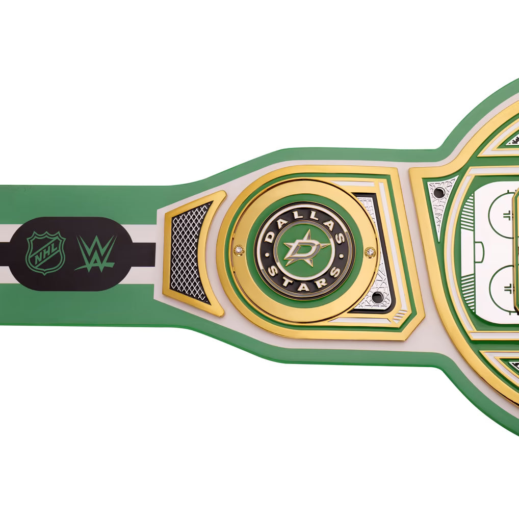 Close-up of a championship belt with Dallas Stars logo and NHL and WWE logos on a white background