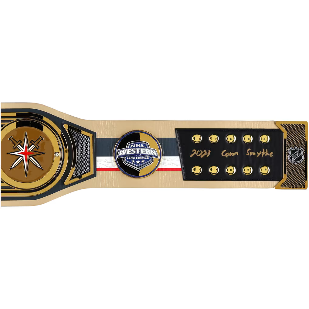 A commemorative hockey championship belt featuring the 2021 Conn Smythe award. The belt has a light wood-grain base with black and gold accents, a gold star emblem on the left, a central circular 'Core Western Conference Champions' badge, and a black plaque on the right with gold '2021 Conn Smythe' script and NHL logo.