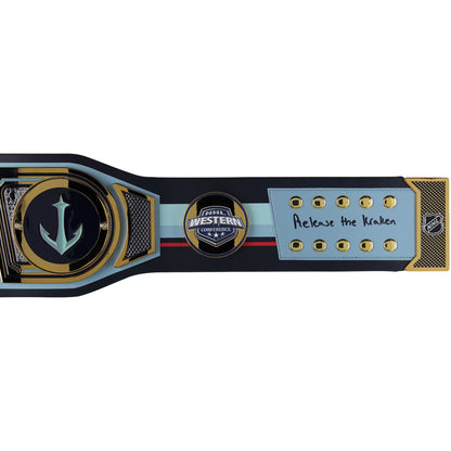 A custom championship belt featuring a large anchor emblem on the front, a central circular 'Western Championship' logo, and a light blue panel with gold studs and the handwritten text 'Release the Kraken'. The belt has a black, gold, and light blue color scheme with a hockey stick design on the side.