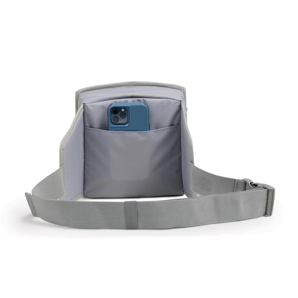 A gray crossbody phone bag with an adjustable strap, shown with a blue smartphone in its front pocket, on a clean white background.