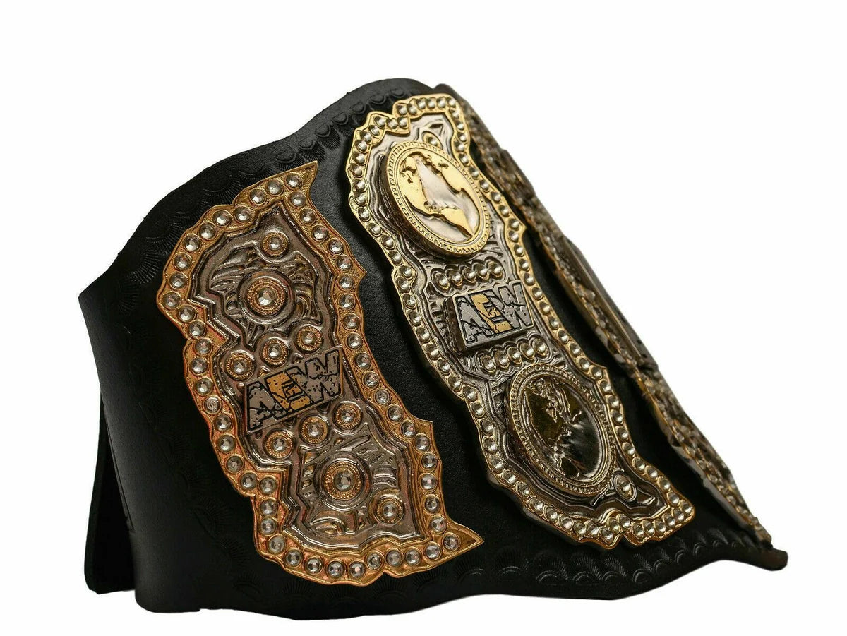 Decorative leather belt with intricate gold and bronze designs on a white background