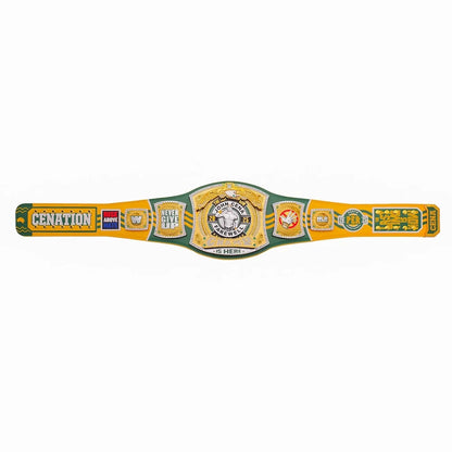 A colorful replica or collectible championship belt laid flat on a white background. The belt features a central gold and green plate with a lion emblem and the words 'CROWN PRIZE CHAMPIONSHIP', flanked by yellow and green sections with various sponsor-style logos including 'CENATION' and 'HAWK'.