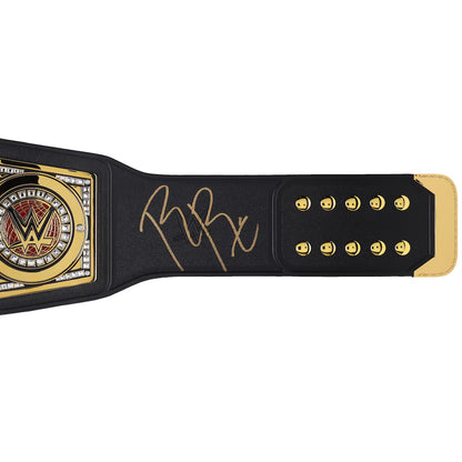 Wrestling championship belt with gold accents on a white background