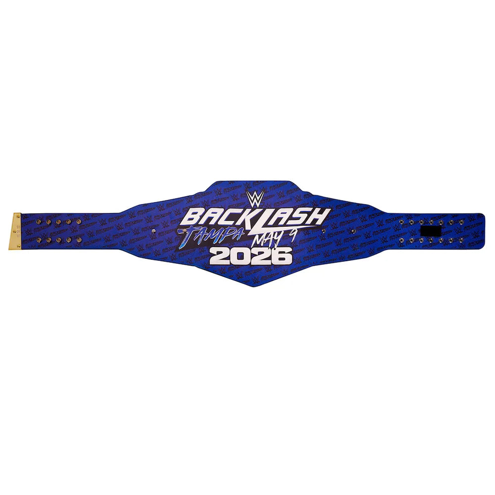 A blue and purple patterned WWE Backlash 2026 championship belt with white text and gold-tone studs, shown horizontally on a plain white background.