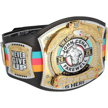 A custom WWE John Cena 'Farewell' championship belt featuring a large gold central plate with silver and black details, a smaller gold 'Never Give Up' plate on the side, and a black strap accented with red, teal, and orange stripes.