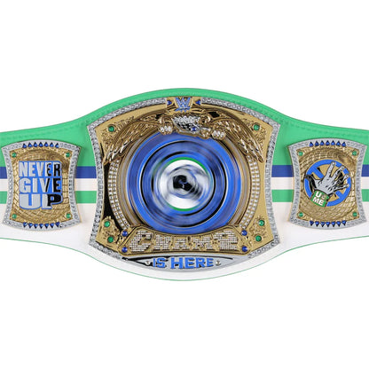 A custom WWE championship belt featuring a green and white strap with blue stripes, a large gold central plate with a blue circular center, and two side plates with gold and silver panels.