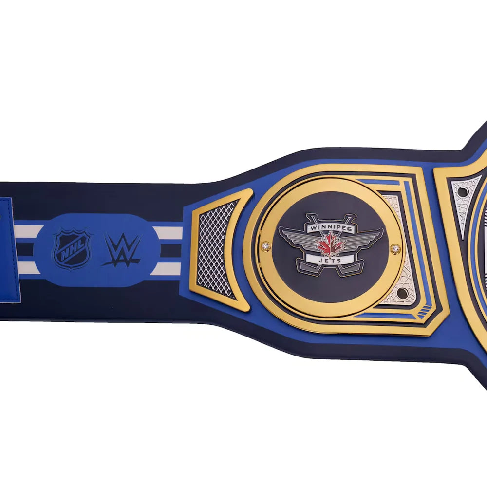 A replica WWE Raw Championship belt featuring a blue strap with gold and silver accents, displaying the NHL and WWE logos on the left, and the WWE Raw Championship emblem in the center.
