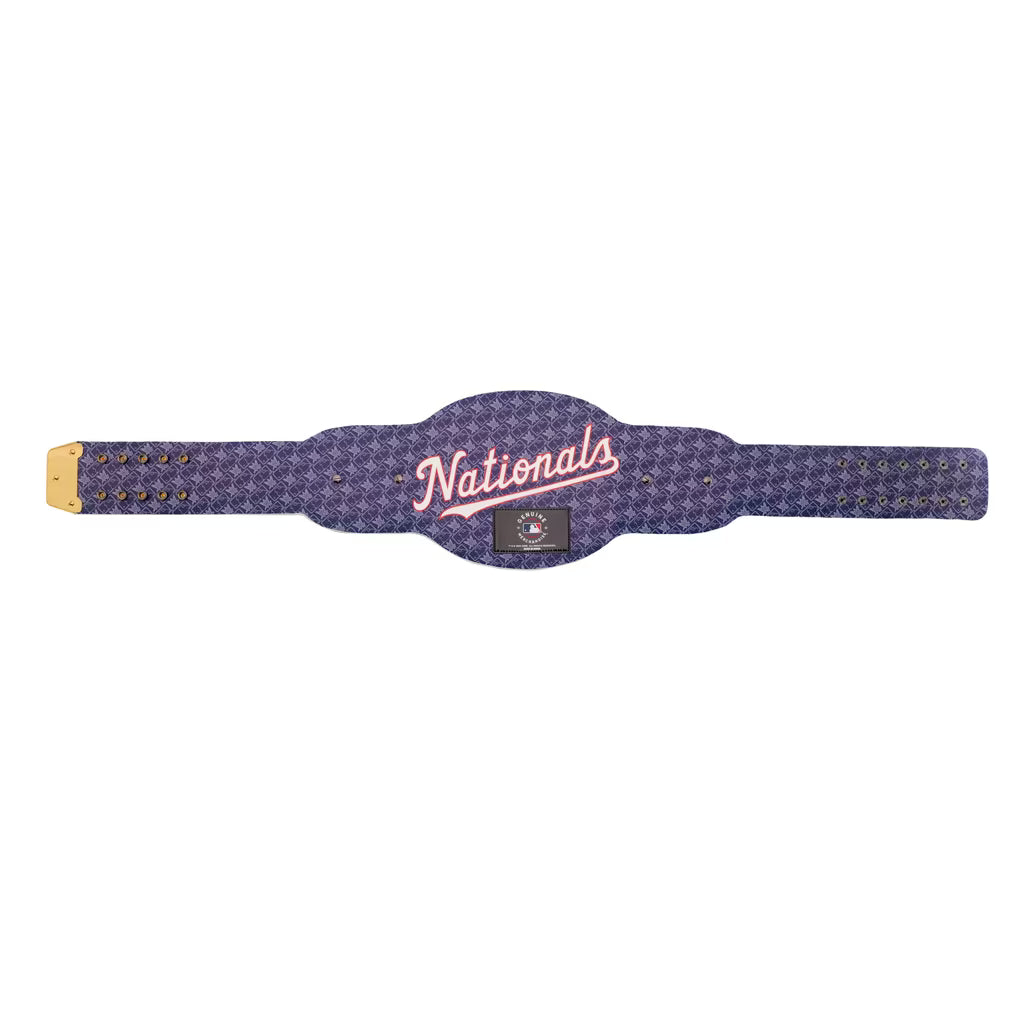 A purple and blue patterned championship belt with 'Nationals' written in pink script on the center plaque, shown against a plain white background.